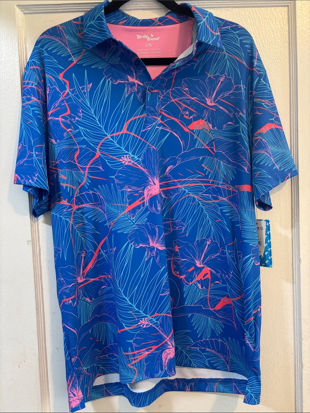 Breakwater Bound Men's Blue Polo with Pink Floral Pattern